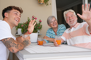 Family waving to neighbors while staying at their Seaside Park rental